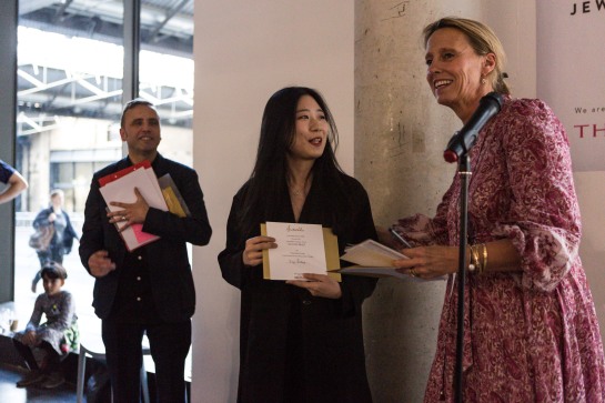 Picture of Jing Jiang receiving the award from Annoushka